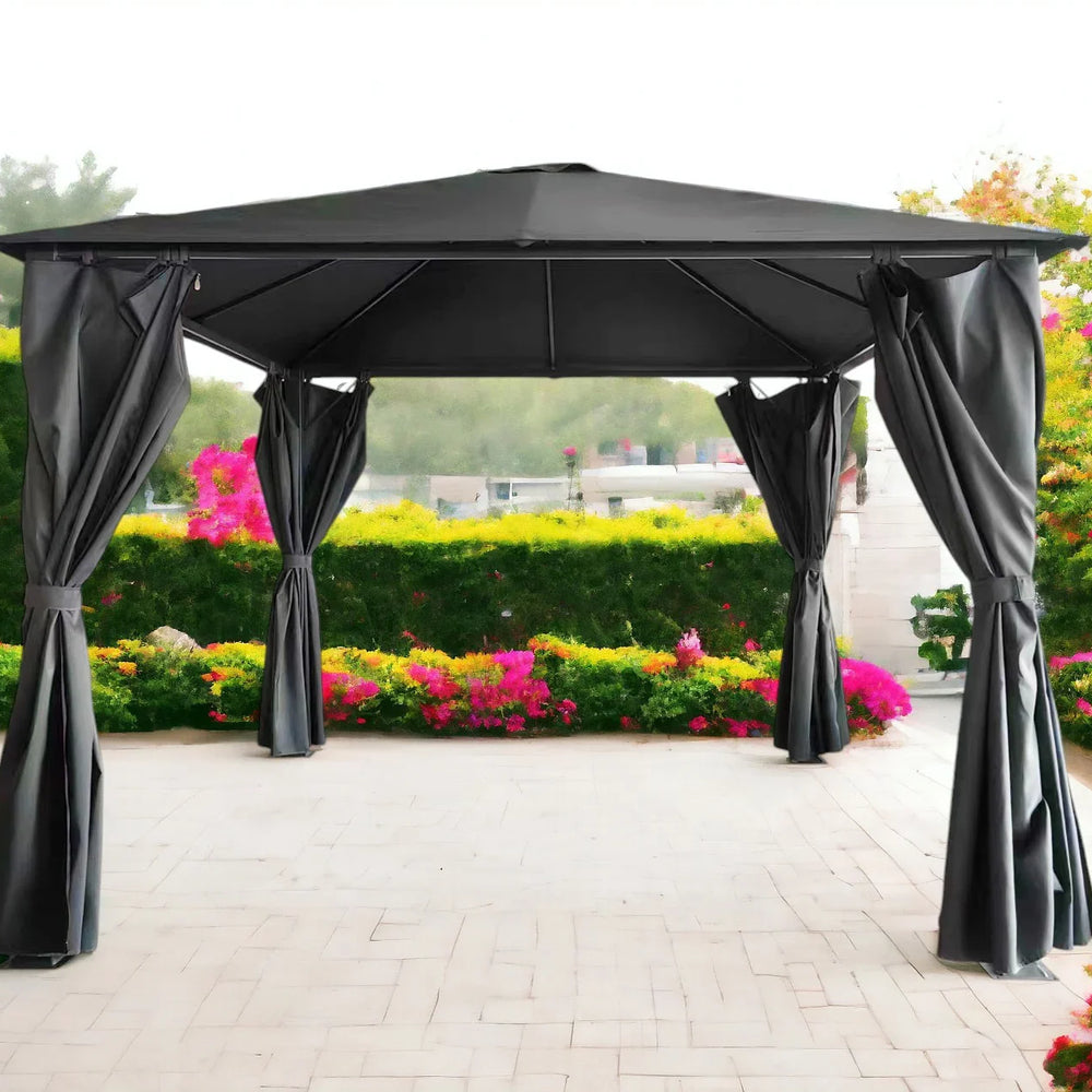 Black outdoor garden gazebo with curtains on patio, surrounded by hedges and flowers