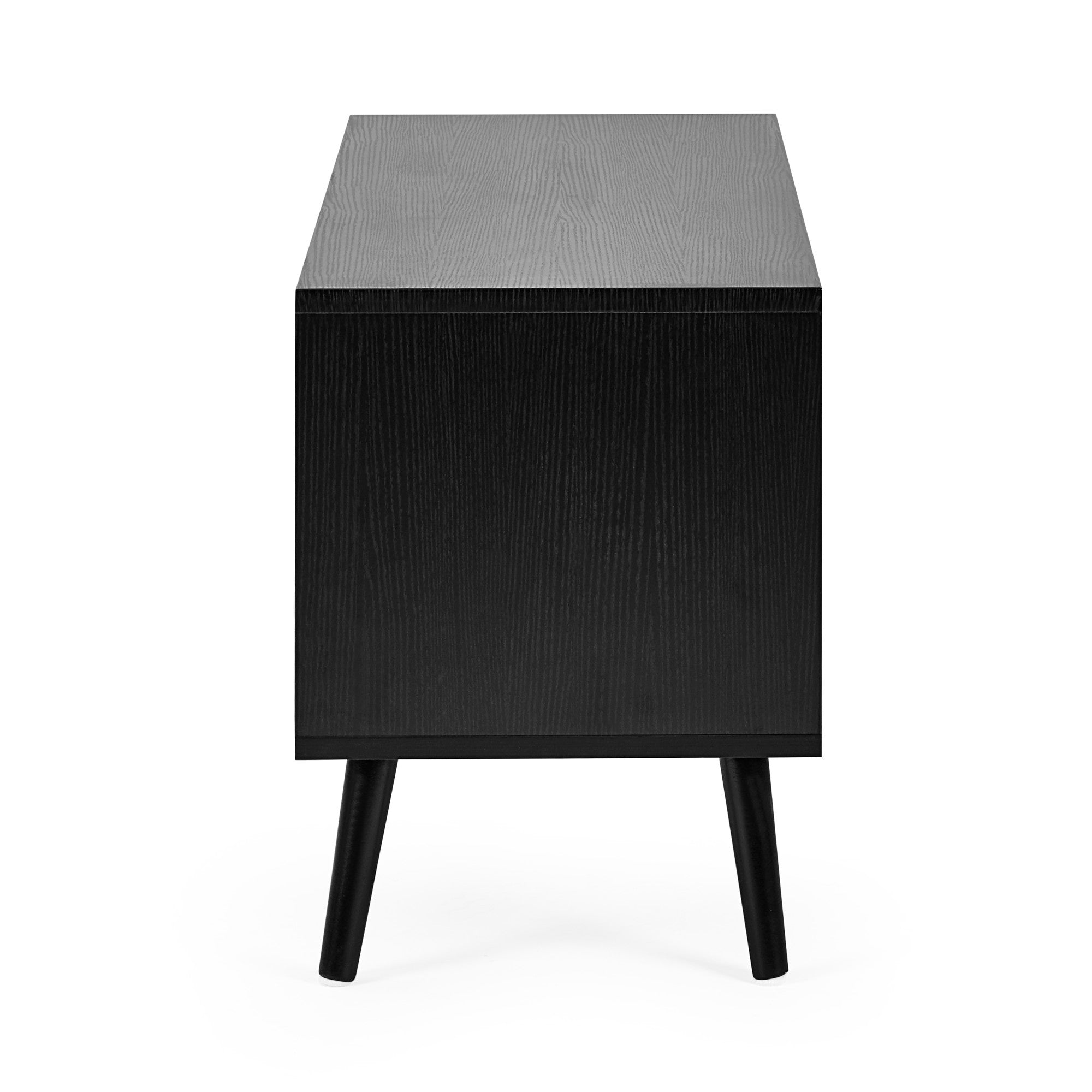 Side view of small black wood TV unit showing wood grain texture and tapered legs