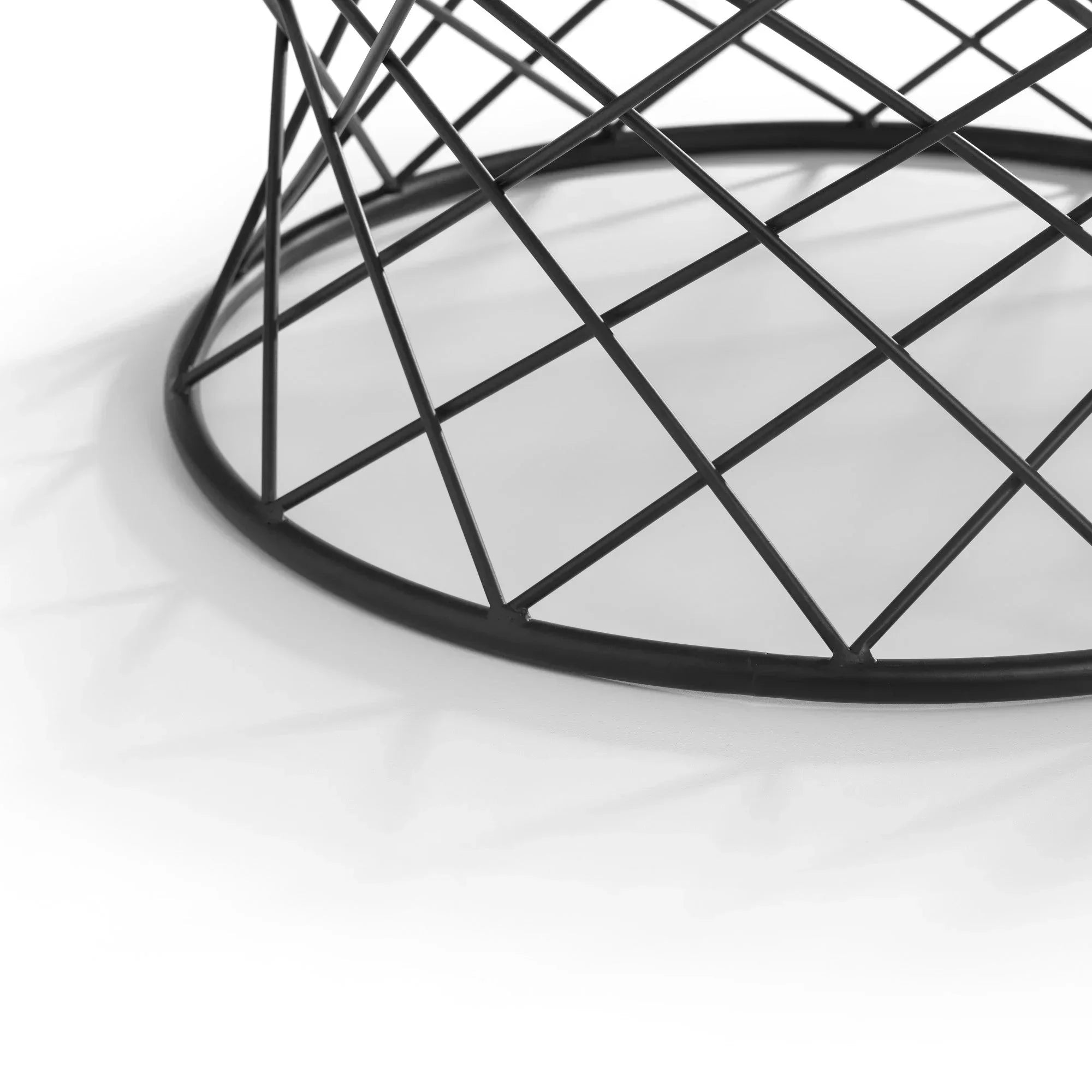 Black metal wire coffee table base with geometric pattern on white background