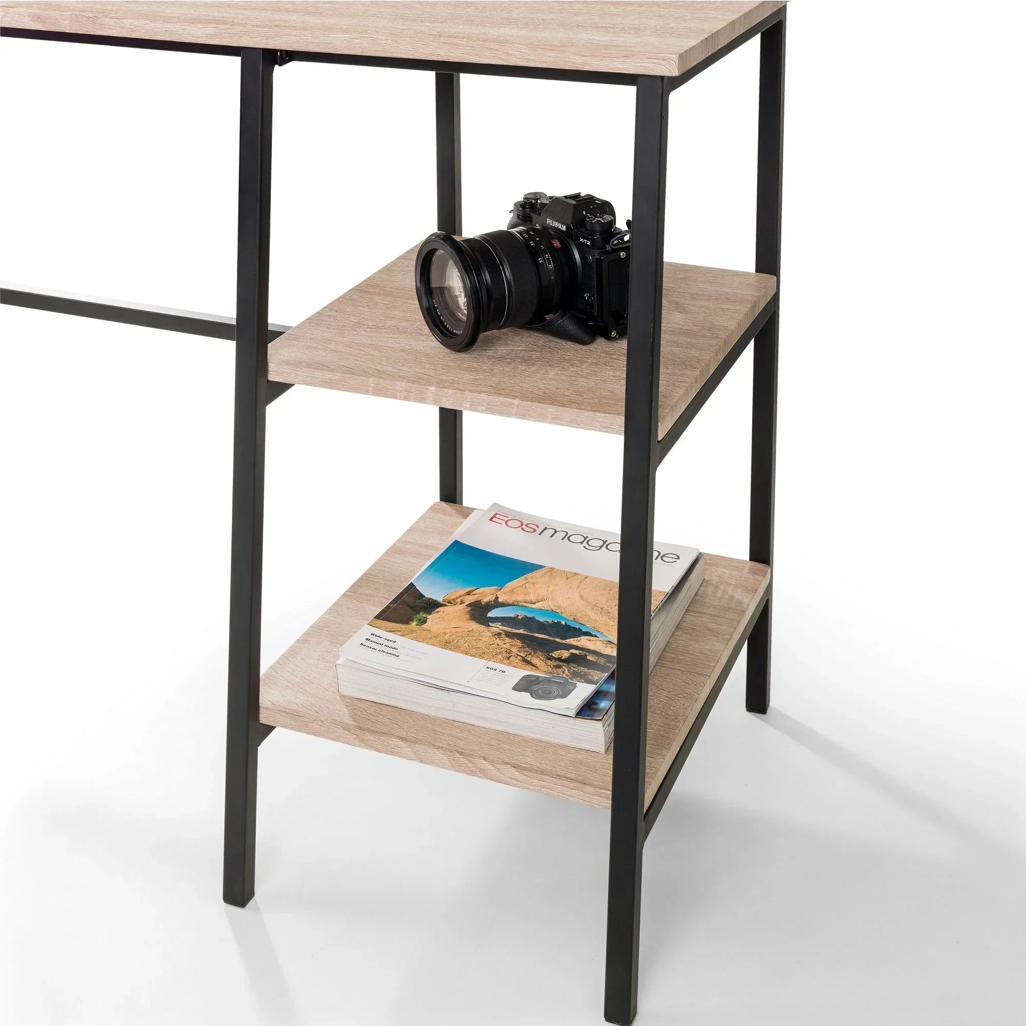 Tribeca desk Sonoma oak closeup showing shelves with camera and magazines
