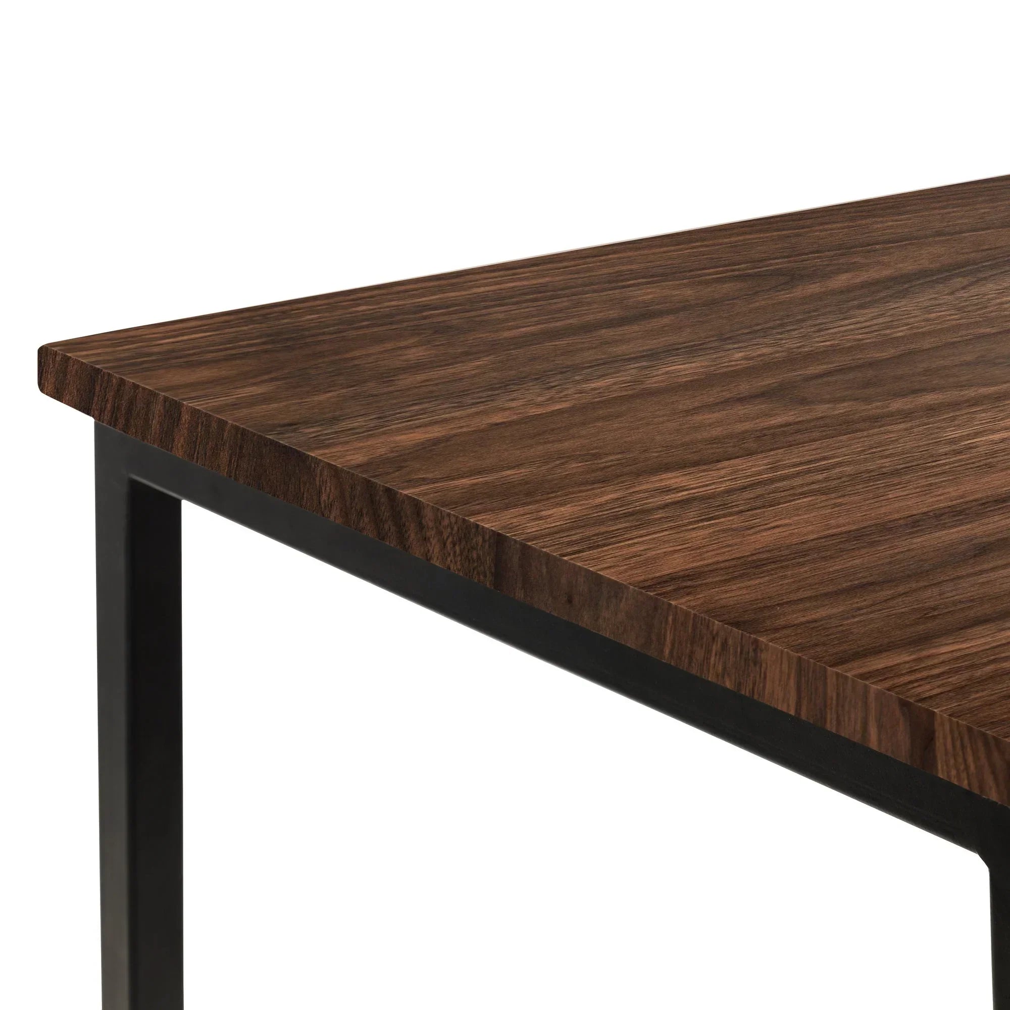 Walnut desk with black metal frame, close-up of corner and wood grain detail