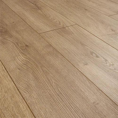 Tawny oak laminate flooring with wood grain texture and matte finish shown at a side angle
