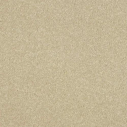 beige carpet sample with soft textured pile, close-up of flooring material surface