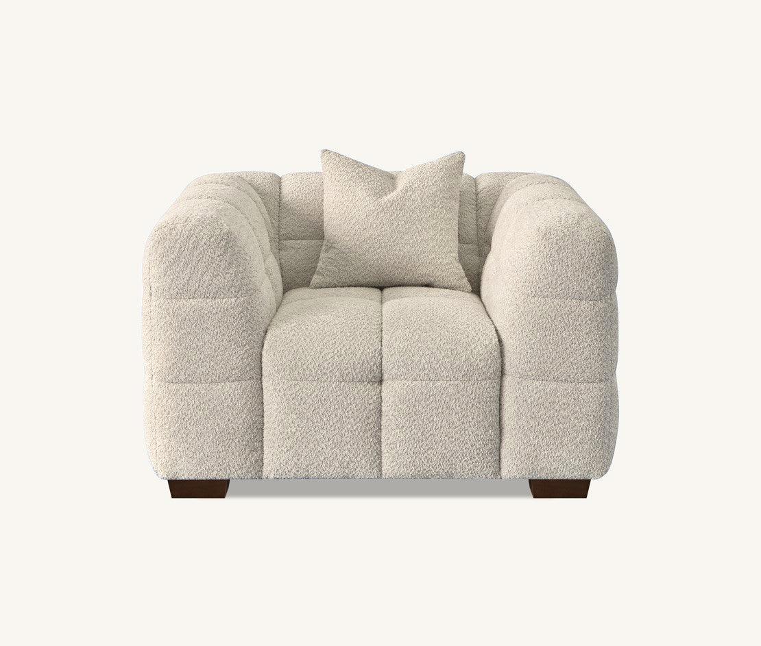 Oatmeal fabric accent chair with tufted upholstery and matching cushion, front view