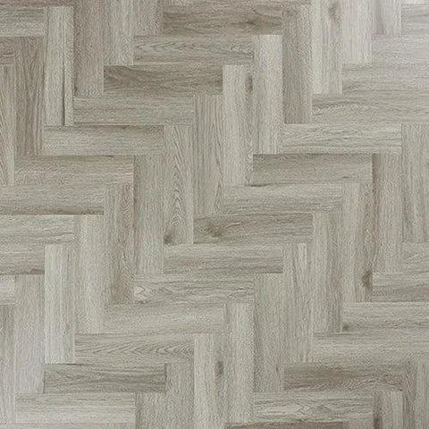 Urban grey herringbone laminate flooring with wood grain texture