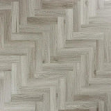 Urban grey herringbone laminate flooring with wood grain texture