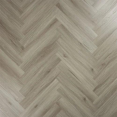 Urban grey wood effect flooring in herringbone pattern, close-up of textured surface