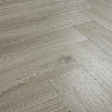 Urban grey wood effect flooring with textured grain pattern in herringbone layout