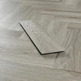 Urban grey wood effect vinyl flooring plank on herringbone floor pattern