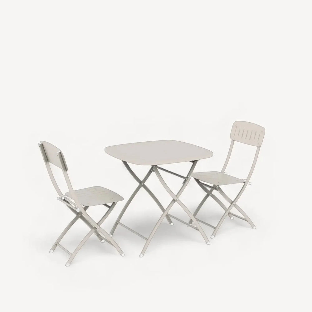 Folding bistro table and two chairs in light beige metal, shown on white background