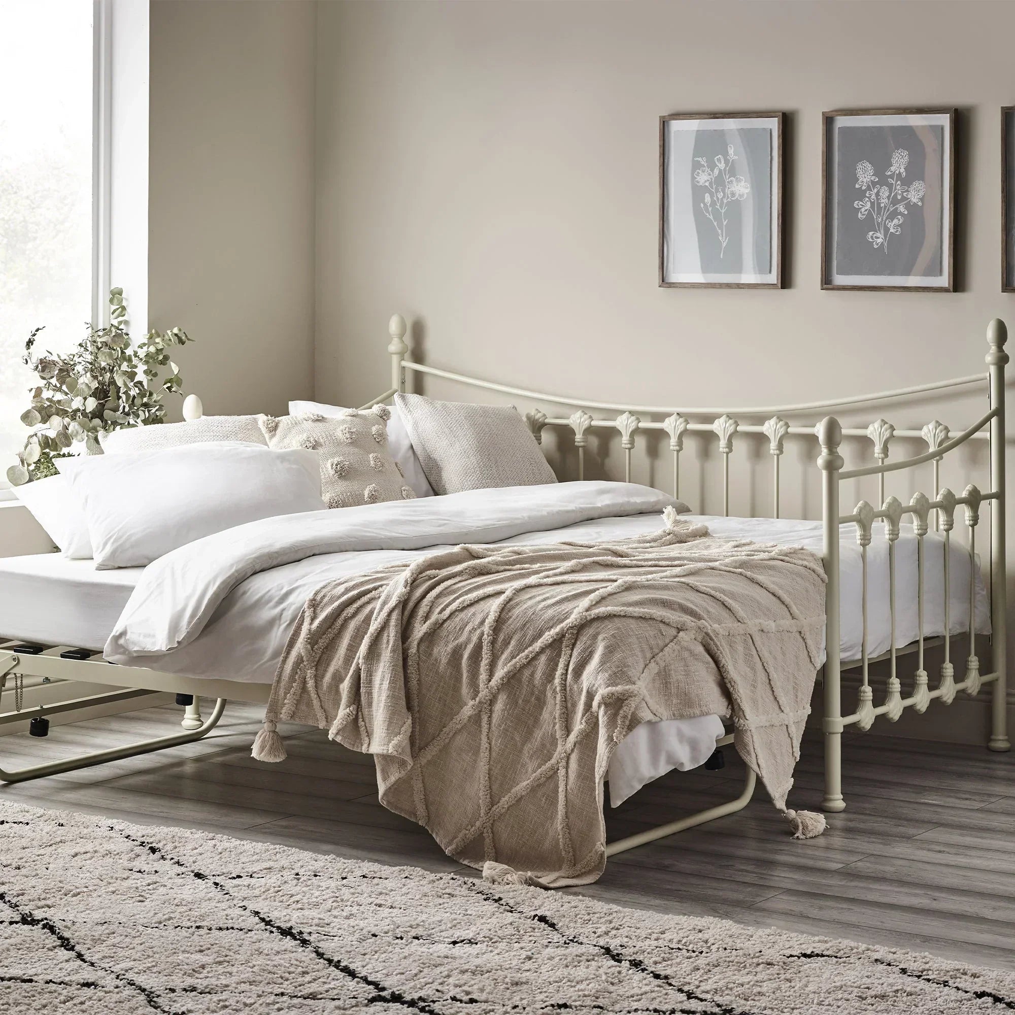 Versailles metal single daybed in stone white with pull-out trundle in modern bedroom