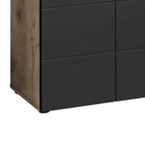 Black drawer chest with oak wood side panel, modern matte finish, corner view