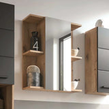 oak wall cabinet with mirror and open shelves, decorative jars on side shelves