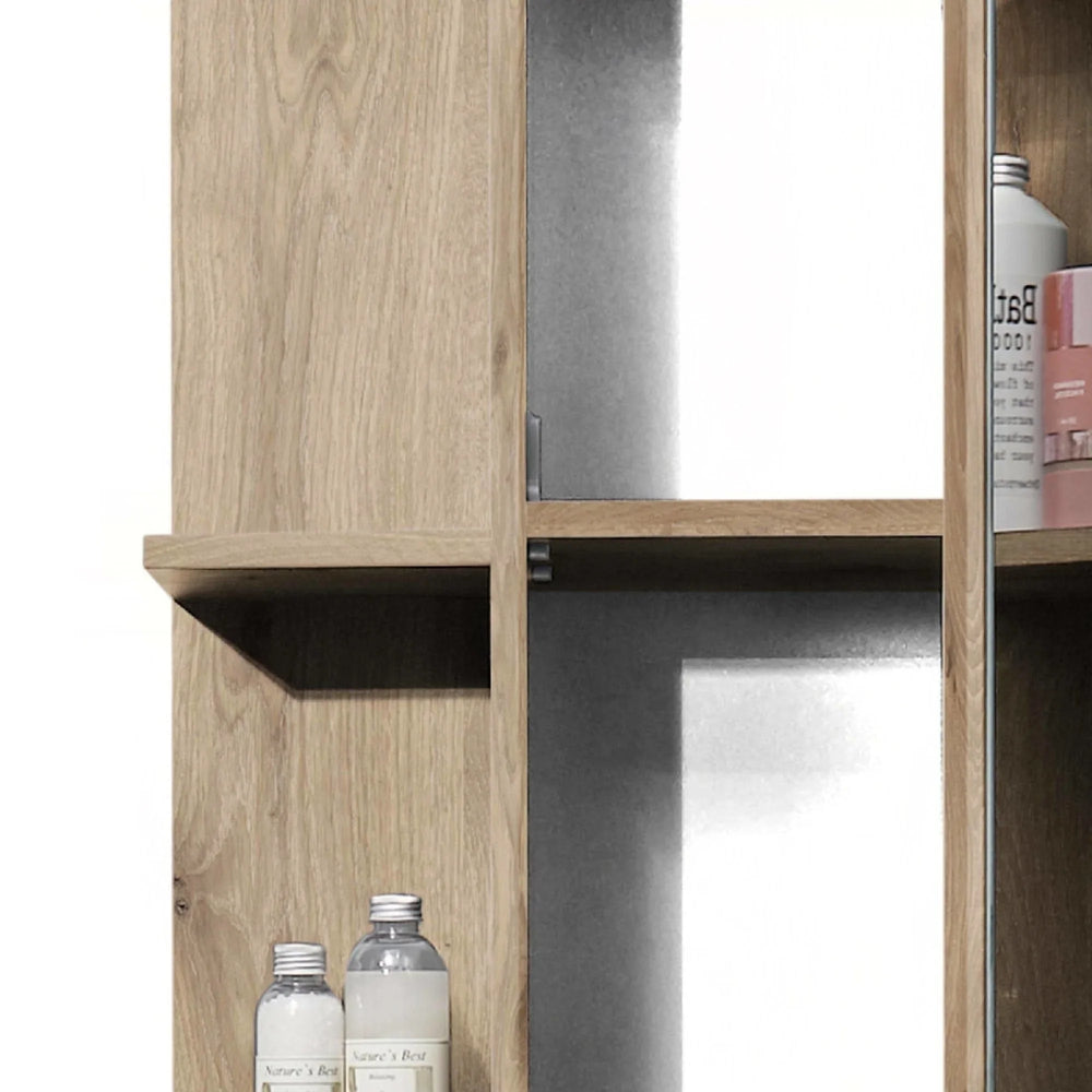 oak bathroom cabinet with mirror door and open shelving displaying bottles