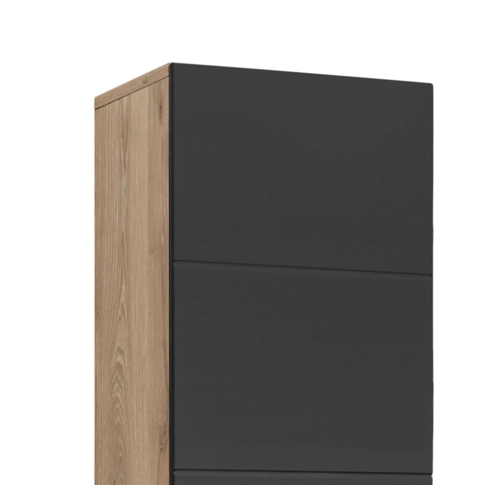 Oak and black chest of drawers with modern flat front panels, side angle view