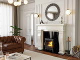 Brown leather chesterfield sofa in modern living room with fireplace and marble coffee table