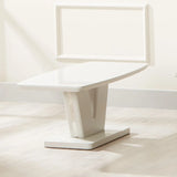 White gloss coffee table with modern angular base on light wood floor