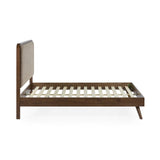 Walden bed frame side view showing beige upholstered headboard and dark wood frame with slat support