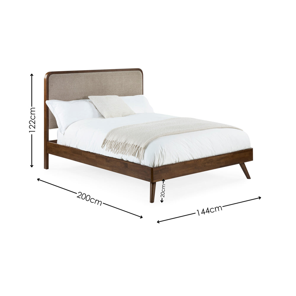 Wooden framed bed with beige fabric upholstered rounded headboard, white bedding, angled front right view, dimensions visible