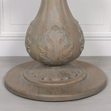 Carved wood dining table pedestal base with leaf detailing on round plinth