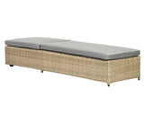 Rattan sunlounger with grey cushions, rectangular shape, side angle view