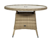 Round rattan outdoor dining table with glass top and umbrella hole, neutral tone finish