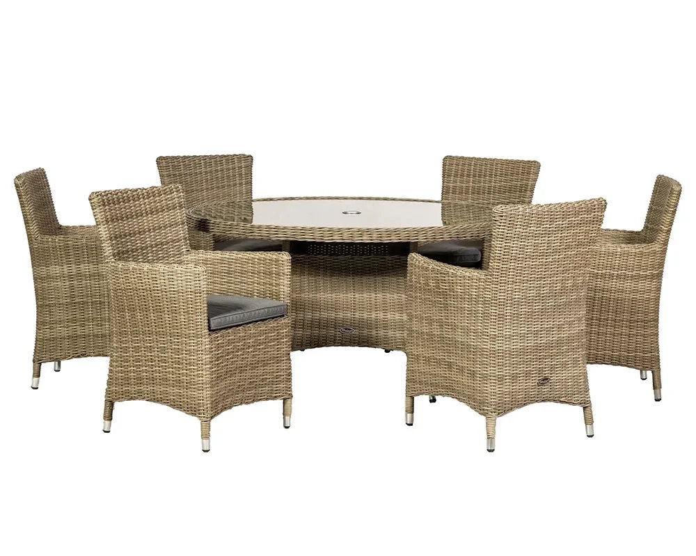 Rattan garden dining set with six armchairs and round glass-top table