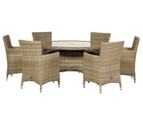 Rattan dining set with six wicker chairs and round glass-topped table, indoor or outdoor use