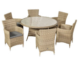 Six piece rattan garden dining set with round glass table and cushioned armchairs