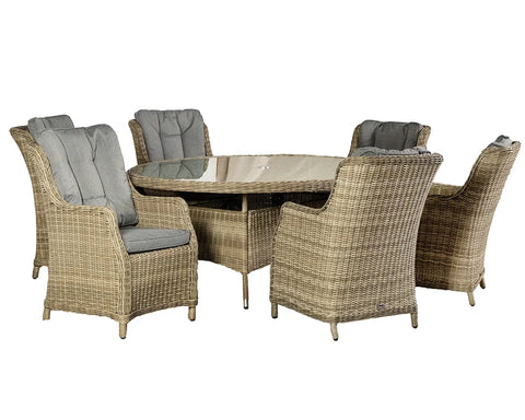 Rattan outdoor dining set with glass-top table and six cushioned wicker chairs