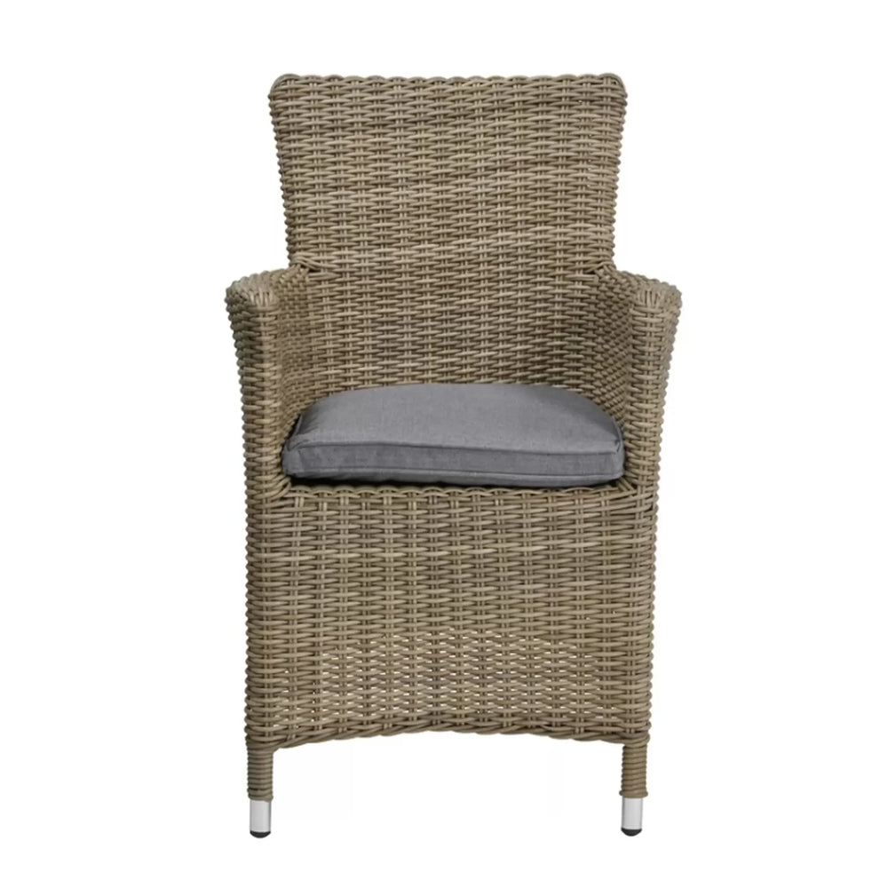 Rattan dining chair with grey seat cushion and armrests, front view