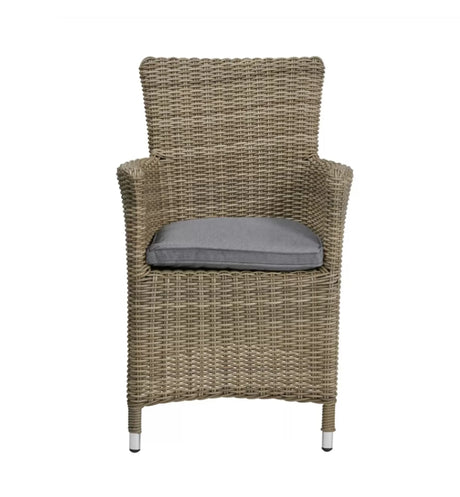 Rattan dining chair with grey seat cushion and armrests, front view