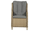Rattan armchair with high back and grey padded cushions, front view