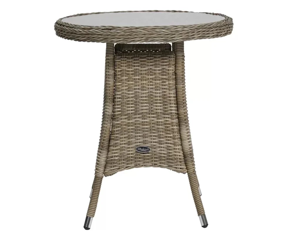 Round rattan garden table with glass top and angled legs, suitable for outdoor dining
