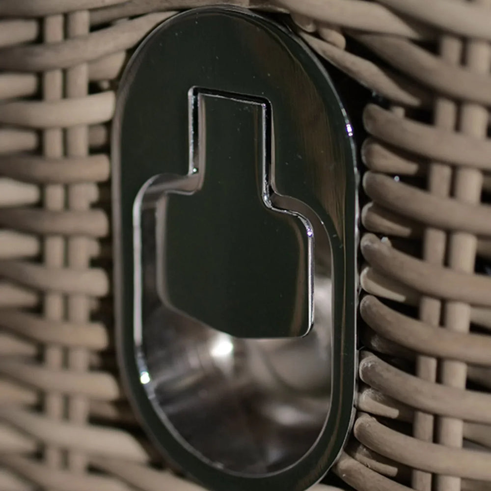 Close-up of rattan garden furniture with integrated metal bottle opener feature