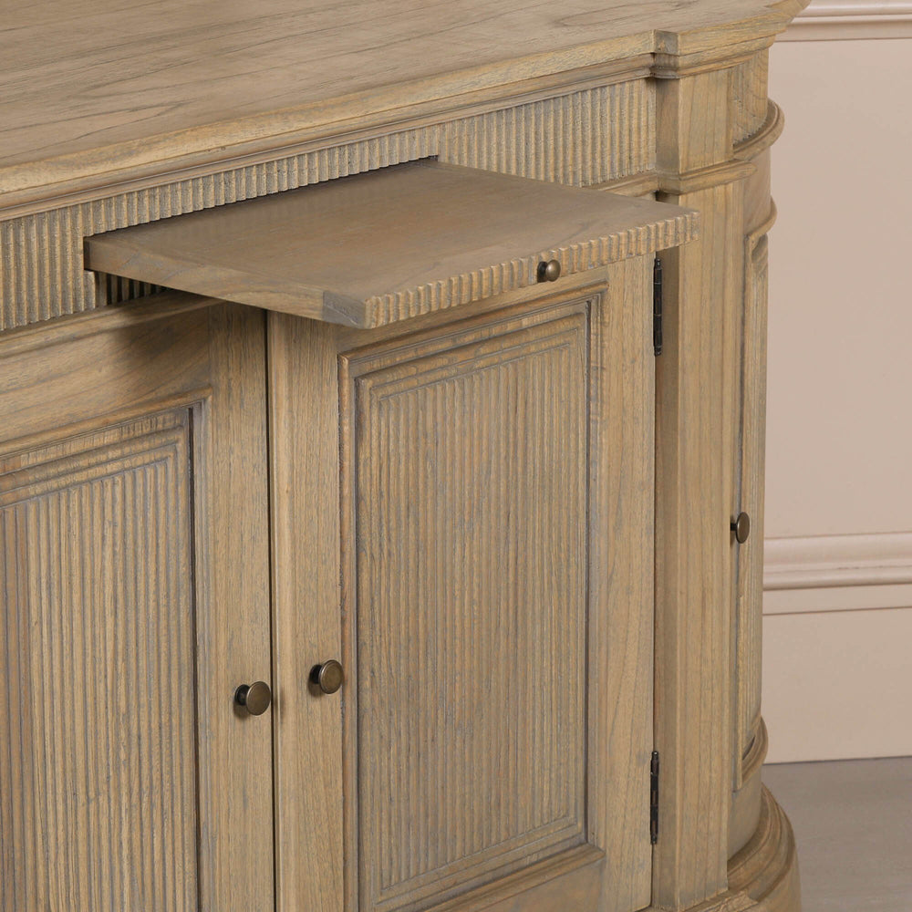 Rustic wooden buffet sideboard with fluted design and a pull-out shelf.