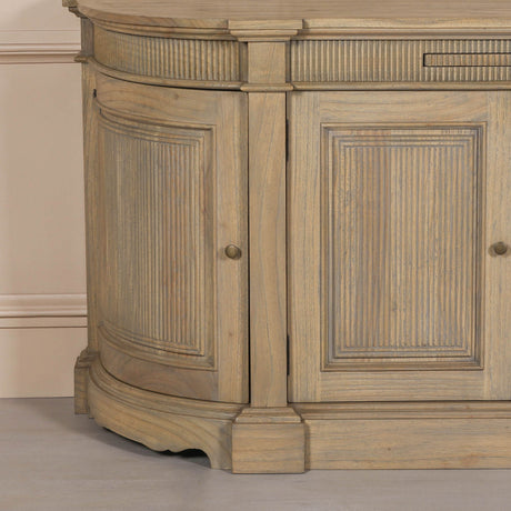 Rustic wooden buffet sideboard with fluted detailing and curved edges.