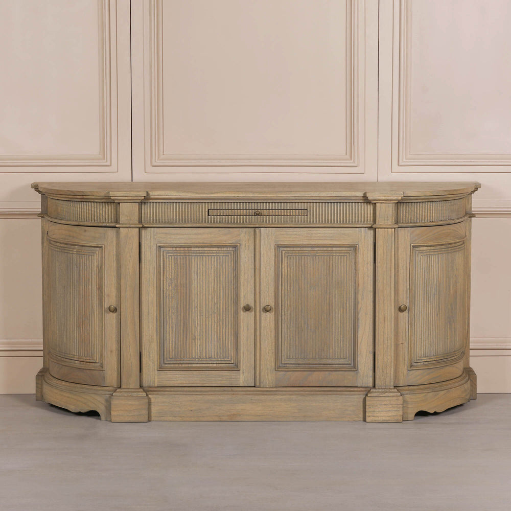 Rustic wooden buffet sideboard with fluted detailing and three doors.