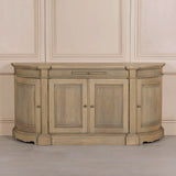 Rustic wooden buffet sideboard with fluted detailing and three doors.