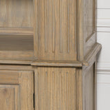 Close-up of a large rustic open bookcase showcasing detailed wood grain and vertical paneling.
