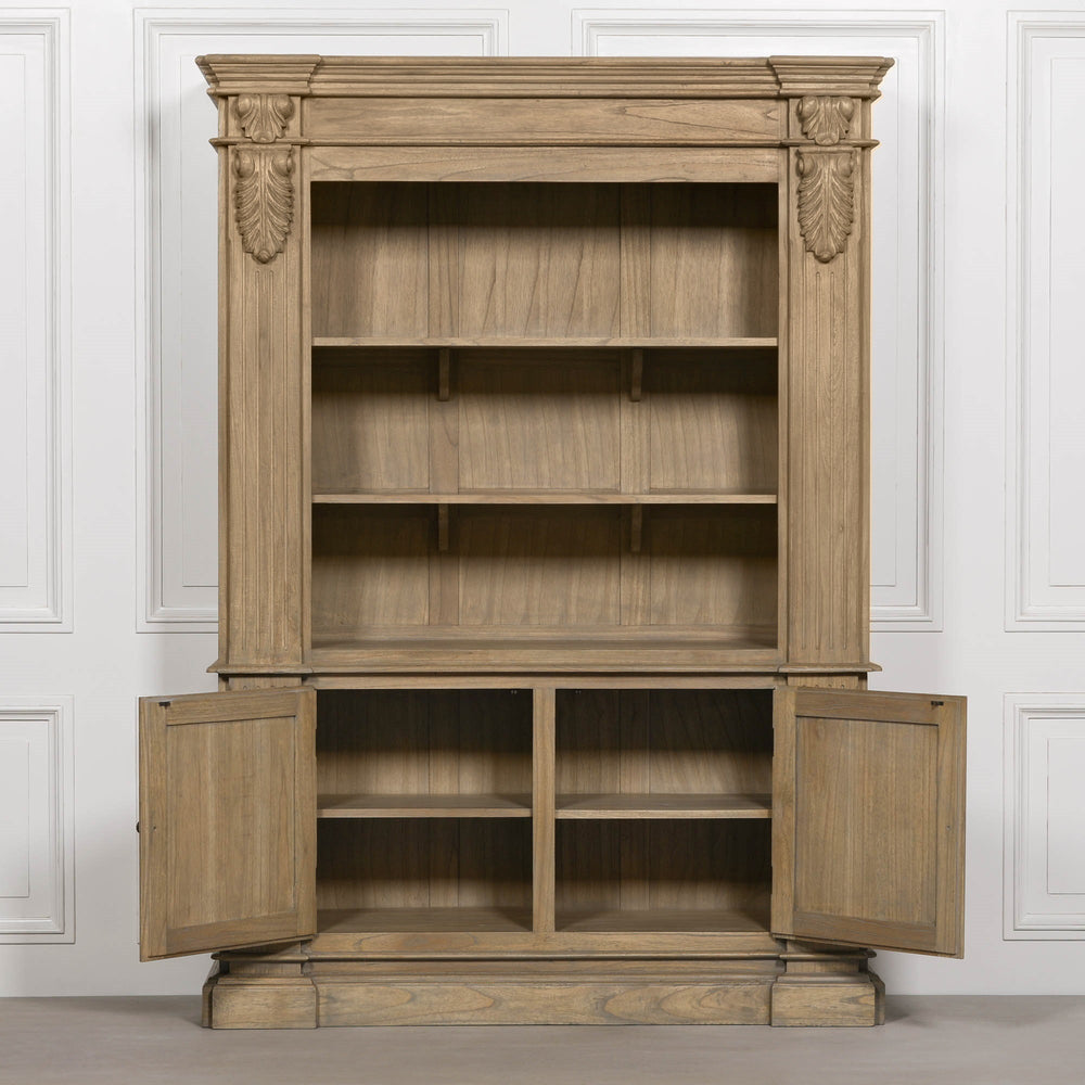 Large rustic open bookcase with multiple shelves and two lower doors, featuring decorative detailing.
