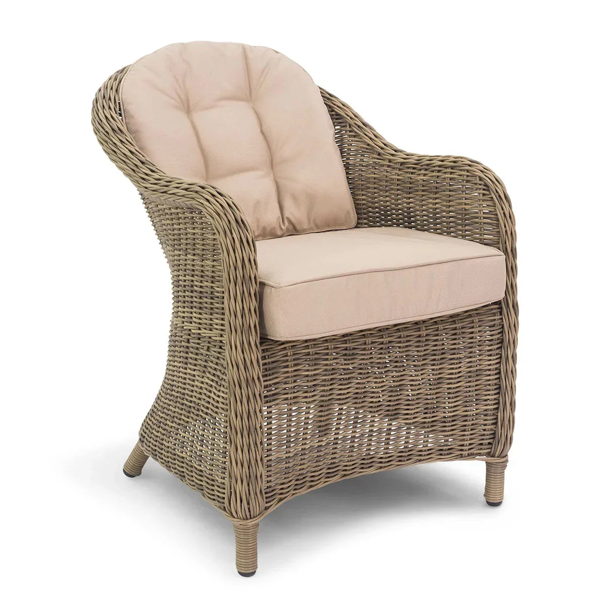 Rattan armchair with beige seat and back cushions, woven frame, shown at an angle