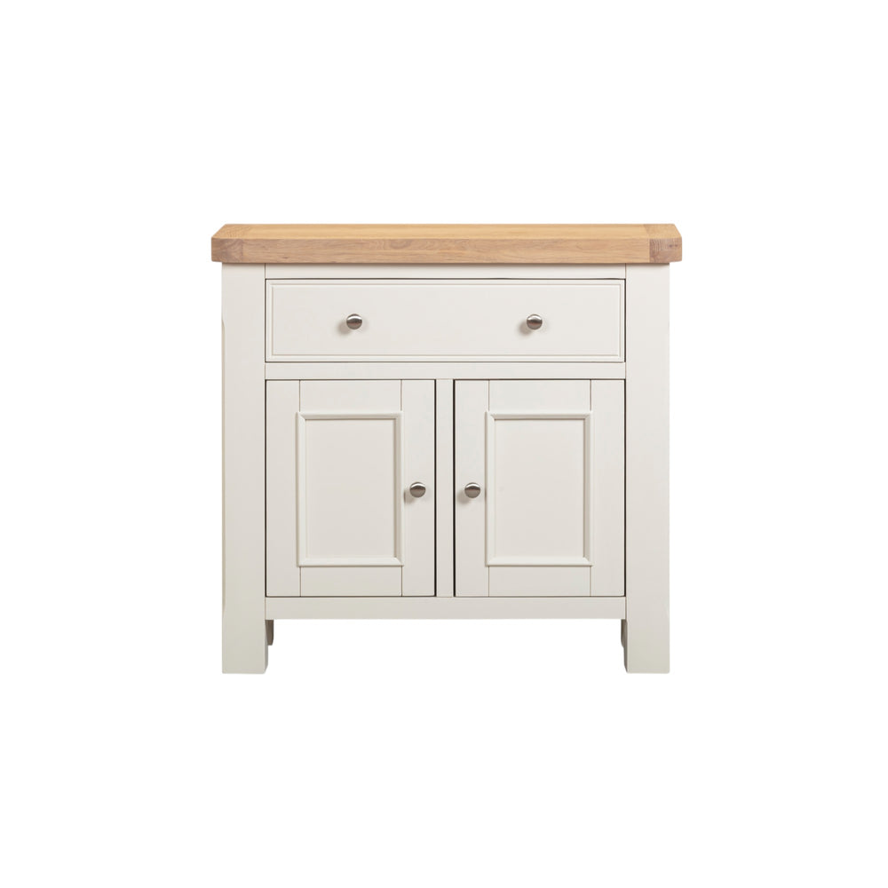 Small cabinet with wooden top and white painted doors on a white background