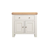 Small cabinet with wooden top and white painted doors on a white background
