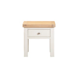 Small wooden side table with a white base on a white background