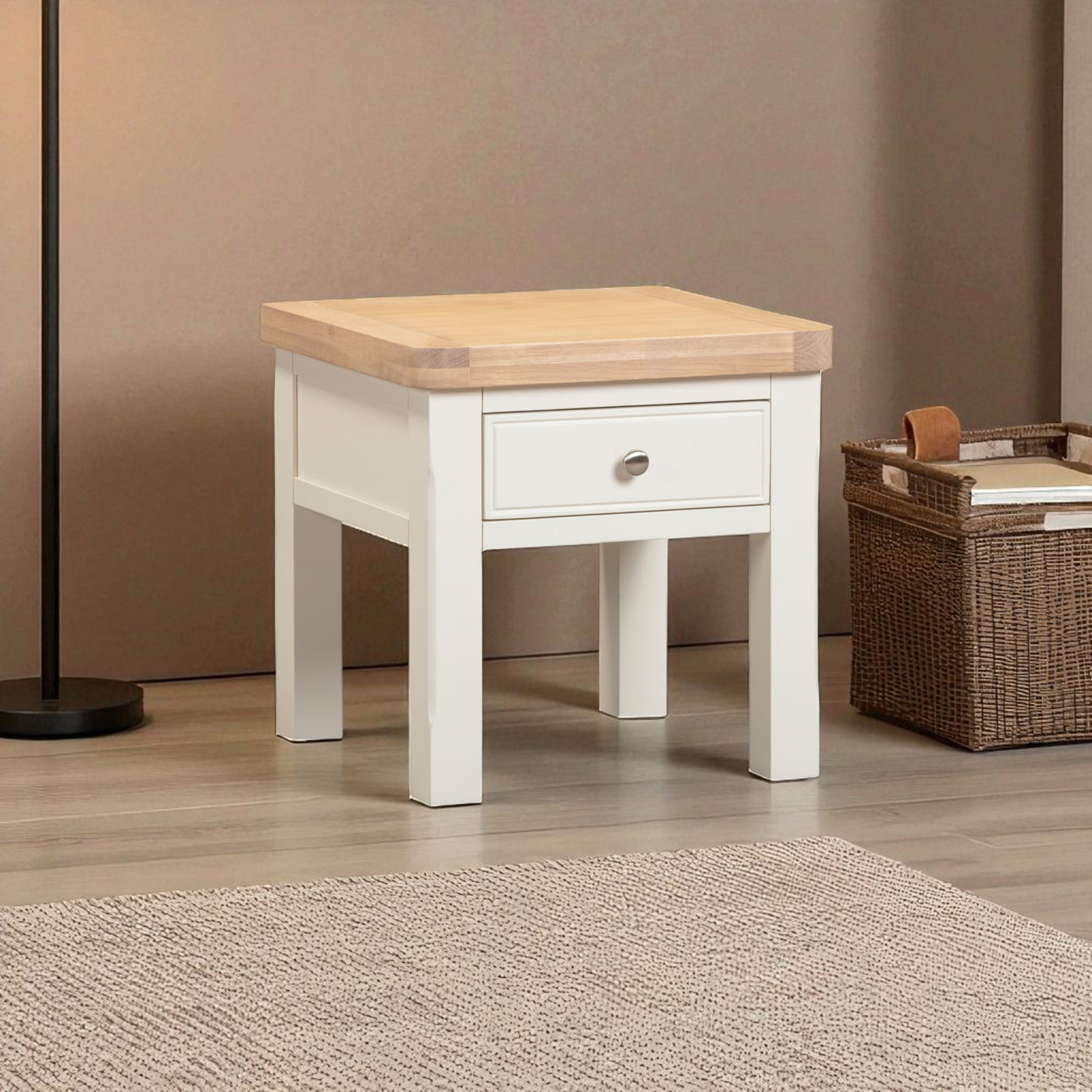 Wooden side table with a drawer in a room setting