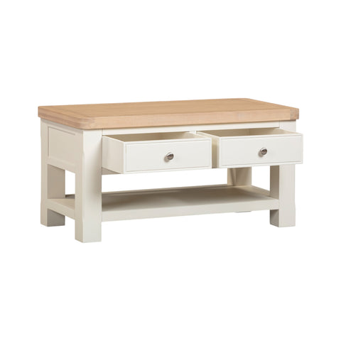 Wooden coffee table with two drawers on a white background