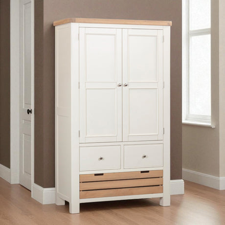 White wardrobe with wooden accents in a room with a window.