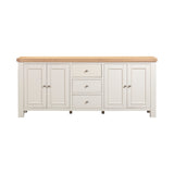 White sideboard with wooden top on a white background