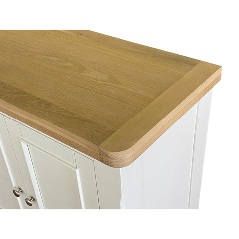 Wooden countertop on a white cabinet with a white background